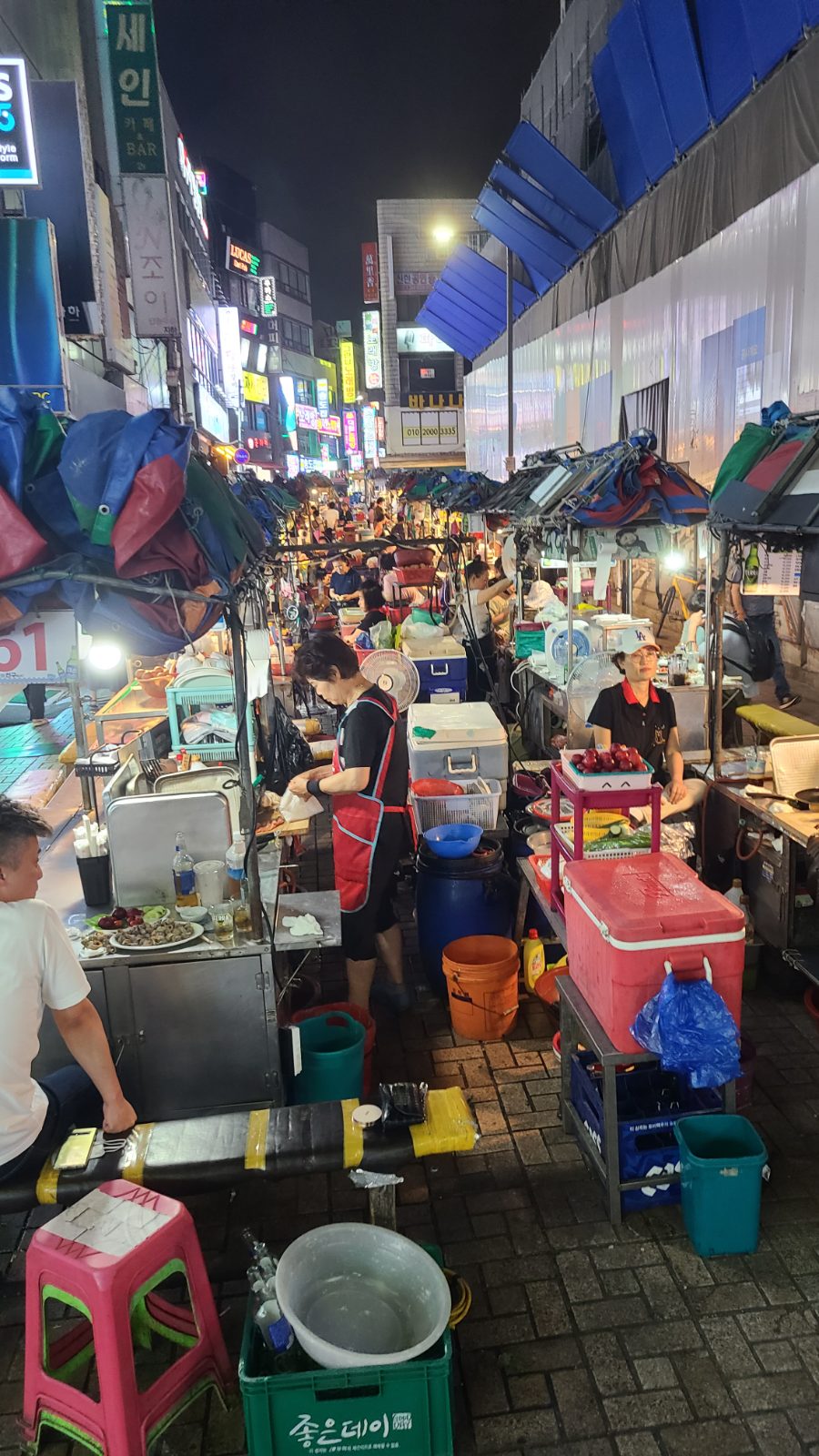 A street food market at night